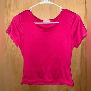 Pink tight fitted shirt. Size medium